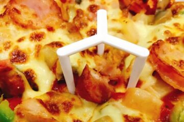 What is the Purpose of the Plastic Piece on a Pizza