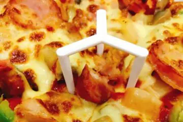 What is the Purpose of the Plastic Piece on a Pizza?